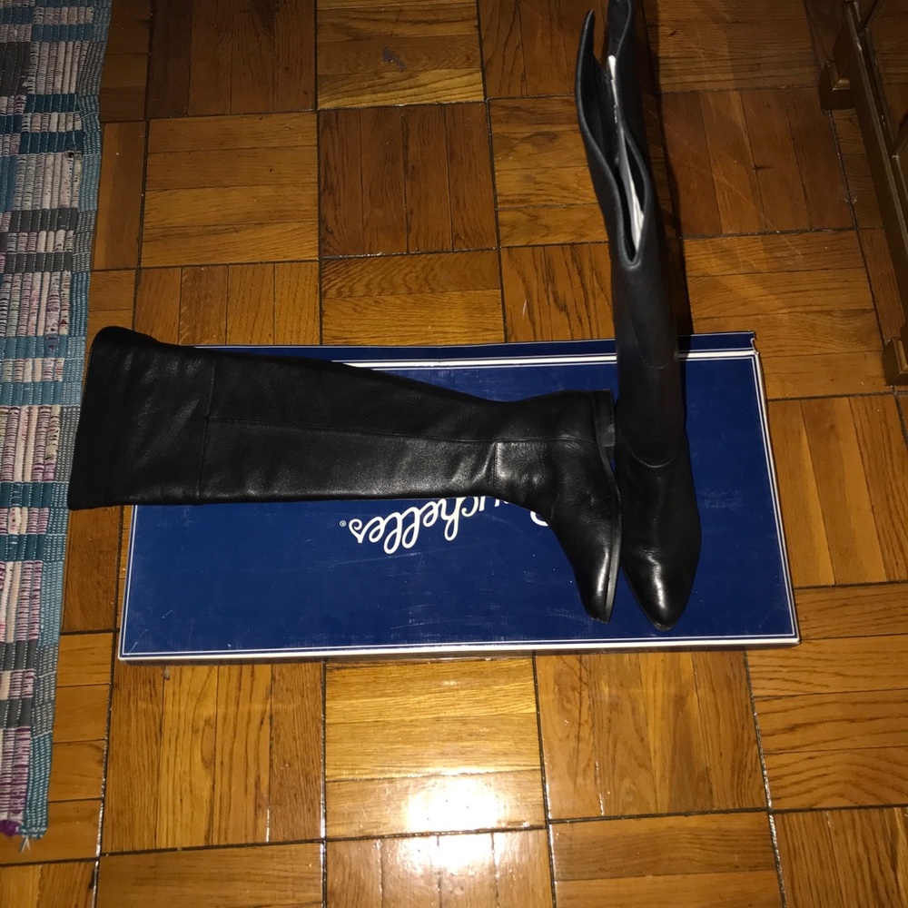 Knee high black leather boots
